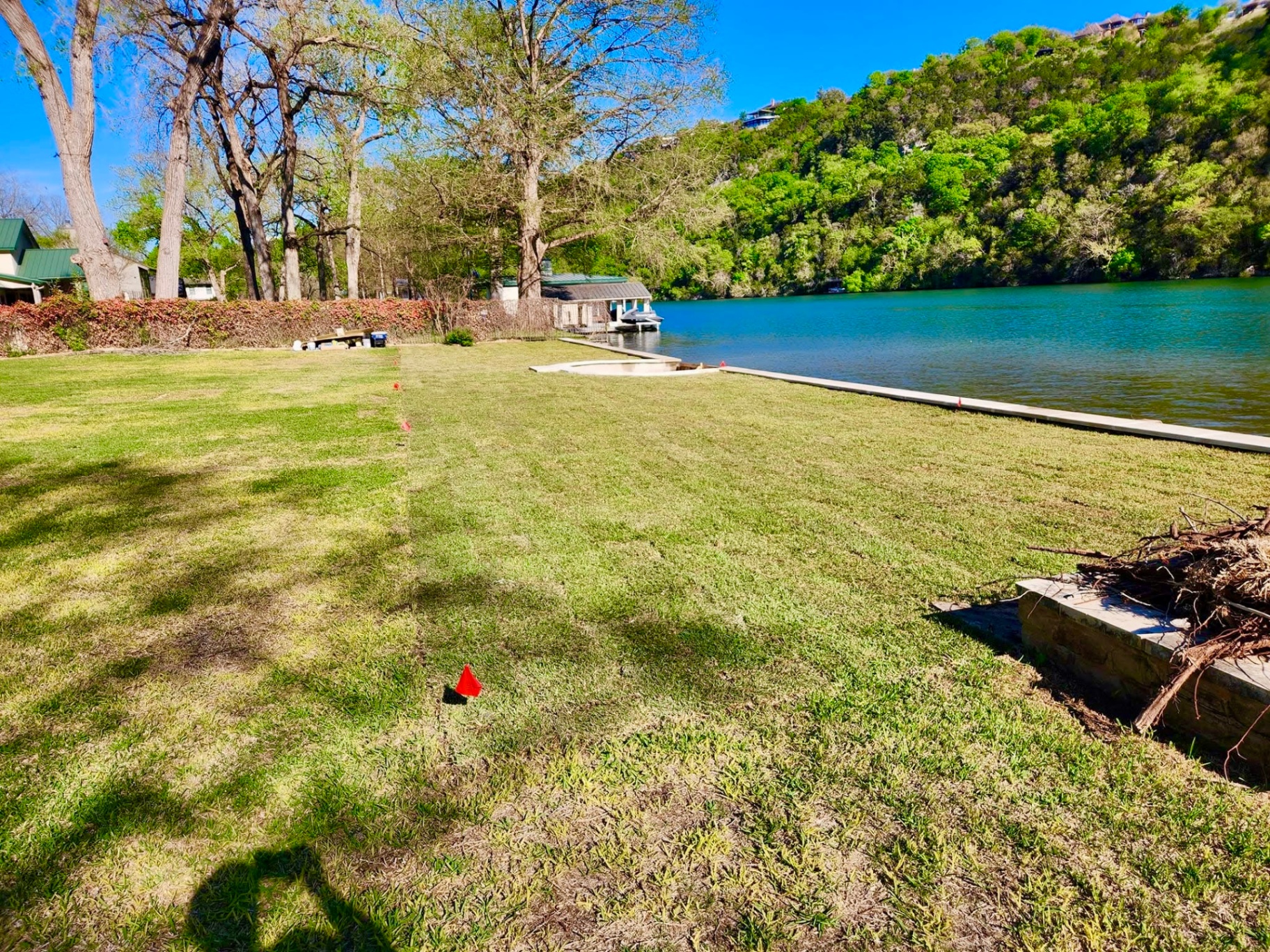 Large lakefront property prepared for new landscaping work in Austin